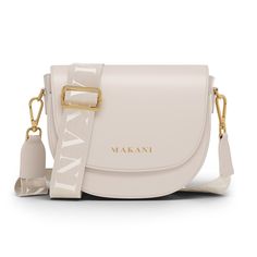 Large handbag made of vegan leather KANA in the timeless color cream by Makani. This larger Halfmoon handbag offers you plenty of space to safely store your daily accessories. The large main compartment can be securely closed with a zipper to prevent unauthorized access. There is also an additional compartment on the front for smaller items. The large main compartment of the bag offers additional subdivision into smaller storage options. The large cover closes the entire bag and has an additional magnetic closure. The elegant strap not only allows for individual adjustment and a high level of comfort, but can also be replaced. This way you can easily adapt the Bigger Halfmoon Bag to the occasion. During production, we use exclusively vegan leather. The material is very durable and at the s Golden Bag, White Handbag, Stylish Shoulder Bag, Coin Wallet, Satchel Handbag, Large Handbags, Braided Strap, Everyday Accessories, How To Make Handbags