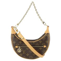 Louis Vuitton Rare Monogram Loop Chain Hobo Crossbody Croissant Bag 1118lv34 Date Code/Serial Number: RFID Chip Made In: France Measurements: Length: 9" Width: 2.5" Height: 8" Shoulder Handle Drop: 14.5"-20.5" Handle Drop: 10" OVERALL NEW CONDITION ( 10/10 or N ) Accessories: Box, Dust Bag, Shoulder Strap, Barcode, Care Card Signs of Wear: Exterior Canvas: New Exterior Leather and Trim: New Interior: New Interior Pocket: New Handle / Straps: New Corners: New Edges: New Hardware: New Odor: None Louis Vuitton Cosmetic Bag, Croissant Bag, Chain Loop, Small Accessories, Louis Vuitton Handbags, Fashion Handbags, Purse Wallet, Made In France, Cosmetic Bag