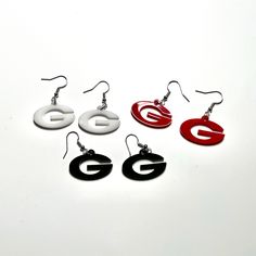 "GO DAWGS! Grab you a pair of these Georgia Bulldog earrings made from acrylic.  The \"G\" is 1 inch in height." Go Dawgs, Georgia Bulldog, Georgia Bulldogs, Jewelry Earrings Dangle, 1 Inch, Bulldog, Etsy Earrings, Georgia, Dangle Drop Earrings