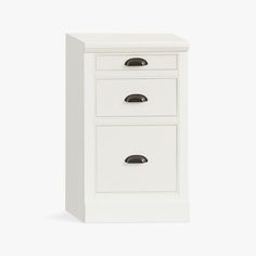 a white cabinet with three drawers on it