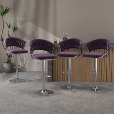 three purple bar stools sitting next to each other