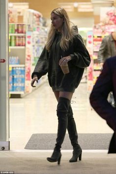 Ugg Boots Style, Sweatshirt Dress Outfit, Hailey Baldwin Street Style, Sweatshirt Refashion, Hailey Baldwin Style, Thigh High Suede Boots, Hooded Sweatshirt Dress, Boots And Leggings, Amelia Earhart