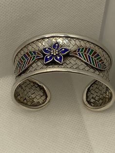 Woven Sterling Cuff Floral Bracelet 925 Silver Braided Enamel Vintage Jewelry Birthday Anniversary Christmas Gift Valentine's Mother's Day https://www.etsy.com/listing/1143443175/woven-sterling-cuff-floral-bracelet-925 Traditional Sterling Silver Braided Bracelet, Traditional Silver Braided Bangle Bracelet, Bohemian Silver Bracelet For Celebration, Traditional Silver Braided Bracelet With Jubilee Style, Bohemian Silver Bangle For Celebration, Handmade Silver Bangle For Celebration, Traditional Sterling Silver Braided Bracelet As Gift, Ornate Multicolor Bracelets For Gifts, Ornate Multicolor Bracelet For Gift