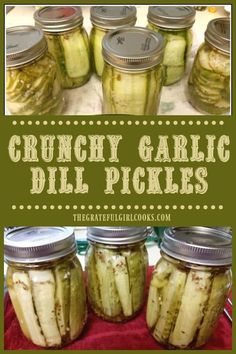 several jars filled with pickles sitting on top of a table