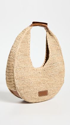 Find STAUD Large Raffia Moon Tote Bag on Editorialist. Woven raffia. Leather base and snap handle. Magnetic snap. Unlined. Weight: 20oz / 0.57kg. Imported, India. Measurements: Height: 7.75in / 20cm Length: 15.75in / 40cm Depth: 4.75in / 12cm Handle drop: 9in / 23cm Woven Raffia, Natural Tan, India Fashion, Large Bags, Snap Closure, Tote Bag, Leather