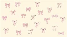 many pink bows are arranged on a white background