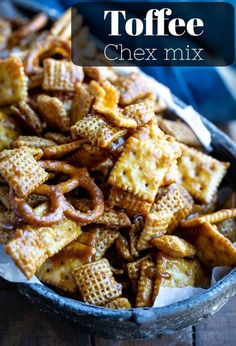 cheesy crackers and pretzels in a bowl on a table top