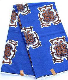 "Ankara Fabric Royal Blue, African Print Fabric Blue, Blue and White African Clothing For Women, Blue Kitenge Fabric, Blue Dashiki Fabric Blue And White Ankara Fabric is fabric for all occasions!! This fabric can be used in making dresses, skirts, shirts, jackets, hair wraps, sarongs, bags, cover sheets, and all forms of crafts. The imaginations are endless!! 3 Panels 6 Yards. One panel covers about 2 yards.  Fabric is in continuous  6 yards. 100% cotton, 46\" inch width, 90\" Length   Please NOTE: Fabric is authentic and comes with a manufacturers label on one side. This label can easily be removed by pressing the wrong side of the fabric with an iron. Label may leave a sticker feeling on fabric after removed/peeled off. Photos may appear lighter/darker depending on your computer monitor Traditional Blue Fabric With Traditional Patterns, Traditional Blue Batik Print Fabric, Blue Ankara Fabric With Traditional Patterns, Blue Printed Ankara Fabric, Blue Cotton Fabric With Traditional Patterns, Blue African Print, Blue Ankara, Ankara Headwrap, Royal Women