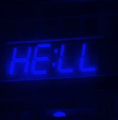 a neon blue sign that says hell on it