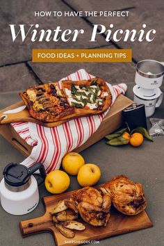 food is sitting on a cutting board with the title how to have the perfect winter picnic