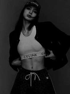 a black and white photo of a woman in shorts with the word celine on it