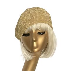 This handmade Gold Metallic Beret Hat is the ultimate fashion statement with its stunning lurex material. Its silky gold satin lining not only adds a touch of luxury, but also helps fight frizz for gorgeous hair. Featuring a comfortable 1" elastic band, this beret is the perfect addition to any outfit. Made in the USA. 6 section crown 1" soft elastic white band inside One size fits most up to 22" Made in USA Dry Clean only Trendy Gold Cap, Elegant Flat Cap For Party, Elegant Gold Mini Hats For Gifts, Elegant Gold Mini Hats For Gift, Elegant Fitted Beret For Parties, Gold Cap Hat One Size Fits Most, Trendy Mini Hats For Winter Parties, Gold Party Hat For Winter, Adjustable Flat Cap For Parties