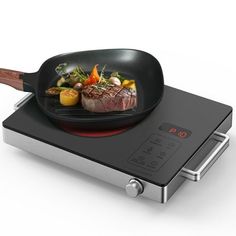 a steak is being cooked in a frying pan on top of an electric stove