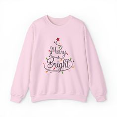 Wrap yourself in the spirit of the season with our 'Merry & Bright' Christmas sweatshirt – because why settle for anything less than merriness and a dash of dazzle? Let your festive style shine! Ideal for any situation, a unisex heavy blend crewneck sweatshirt is pure comfort. These garments are made from polyester and cotton. This combination helps designs come out looking fresh and beautiful. The collar is ribbed knit, so it retains its shape even after washing. There are no itchy side seams on these sweaters. Made with a medium-heavy fabric blend of 50% cotton and 50% polyester (8.0 oz/yd² (271.25 g/m²)), this sweatshirt feels cozy and is the perfect choice for those colder months. The classic fit along with the crew neckline deliver a comfy wearing experience with a clean-cut style. Me Merry And Bright Sweatshirt, Merry Bright Christmas, New Groove, Bright Christmas, L And Light, Pink Sand, About Christmas, Retro Font, Classic Holiday