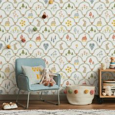 a child's room with wallpaper and toys on the floor