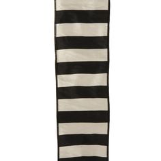 a tall black and white striped rug