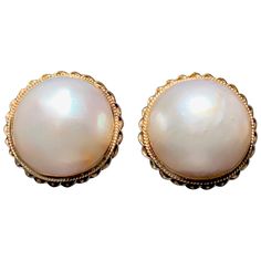 This elegant and wearable pair of ear clips features wonderful and large mabé pearls. The pearls are set in 14 karat yellow gold and decorated with a twisted gold wire border. Pearl Clip On Earrings, Vintage Pearl Earrings, 1950 Vintage, Mabe Pearl, Ear Clips, Vintage Inspiration, Vintage Pearl, Gold Wire, Birmingham