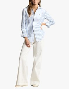 Stay stylish with our Long Sleeve Button Front Shirt from Polo Ralph Lauren. White and Blue striped shirt Signature Pony embroidered at chest Button up style Pointed collar Long sleeves with cuff and button detailing Pleats at back Curved hemline Uni Fits, Striped Shirt Women, White Lake, Blue Striped Shirt, Lauren White, Sweaters Knitwear, Button Front Shirt