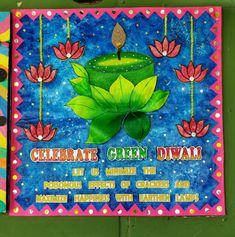 a colorful sign with a candle and flowers on it that says celebrate green diwali