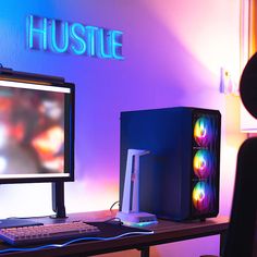 a desktop computer sitting on top of a wooden desk