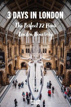 the interior of a museum with people walking around