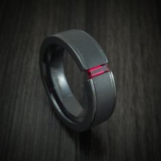 Black Titanium and Ruby Men's Ring Custom Made Wedding Band | Revolution Jewelry Ruby Ring Designs, Mens Ruby Ring, Mens Black Ring, Black Titanium Ring, Black Zirconium Ring, Mens Ring Designs, Escape Pod, Mens Gemstone Rings, Man Ring