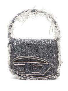 silver-tone appliqué logo crystal embellishment frayed detailing foldover top with magnetic fastening single flat top handle adjustable detachable shoulder strap main compartment internal card slot This piece comes complete with a protective dust bag. Chic Top Handle Bag With Silver-tone Logo Plaque, Designer Evening Bag With Silver-tone Hardware And Top Handle, Designer Evening Bag With Silver-tone Hardware, Designer Silver Evening Bag With Top Handle, Designer Silver Embellished Shoulder Bag, Designer Silver Evening Bag With Detachable Handle, Diesel Shoulder Bag, Chanel 2, Iconic Bags