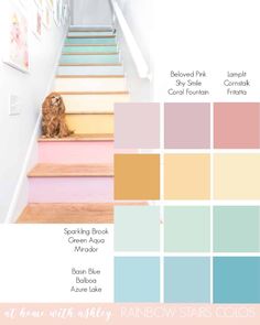 the stairs in this house are painted pink, blue and yellow