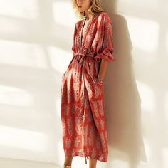 Lynn Floral Kimono Satin Robe Dress. Sexy and lovely kimono style maxi satin dress. Red floral print all over this robe dress works as lounging robe, beach dress or other outings. Gender: WomenItem Type: Dress, RobePattern Type: FloralYoung Style: BohemianMaterial: polyester satinFit: Fits true to size, take your normal size SIZE CHART Size Shoulder (cm) Bust (cm) Waist (cm) Sleeve (cm) Length (cm) S 65 126 -- 35 123 M 67 130 -- 36 124 L 70 136 -- 37.5 125.5 Dress And Cardigan Outfit, Kimono Dresses, Vestidos Boho, Side Split Dress, Kimono Maxi Dress, Kimono Floral, Mode Kimono, Long Sleeve Kimono, Kimono Vintage