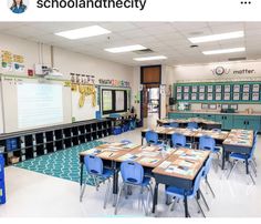 an empty classroom with desks and chairs