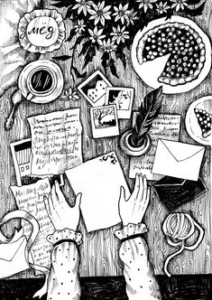 two hands are writing on a piece of paper surrounded by papers and other items, with flowers in the background