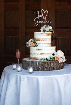 a wedding cake sitting on top of a table