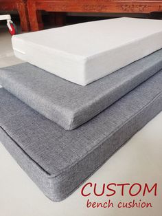 three mattresses stacked on top of each other with the words custom bench cushion above them