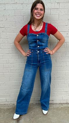 Enjoy a sleek and sophisticated style with our Don't Jump To Conclusions Jumpsuit. Featuring a timeless denim material, body-skimming fit, and classic button-down design, this jumpsuit will rapidly become a fashion favorite for concerts, nights out, and beyond. Trendy, yet tasteful, this jumpsuit ensures you look and feel your luxurious best. 72% Cotton 24% Polyester Small 2/4 Medium 6/8 Large 10/12 Trendy Stretch Denim Jumpsuit With Pockets, Summer Jeans With Button Closure, Summer Full-length Jeans With Button Closure, Stretch Denim Jumpsuit With Pockets, Fitted Denim Jumpsuit With Pockets, Fitted Denim Jumpsuit Overalls With Pockets, Solid Denim Overalls Jumpsuit, Solid Denim Overalls, Fitted Casual Overalls