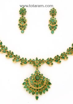 22 karat gold emerald necklace & drop earrings set with intricate workmanship. 
   - 235-GS1173 - in 33.700 Grams for USD $3,889.67 USD. 
Made in India by Totaram Jewelers Online this product is in Gold - 22 Karat BIS Hallmark 916 Gold  & is an excellent gift for Adult - Women. Ships fully insured with secured guaranteed delivery for free with your order over $250 from New Jersey USA & comes with 30 days exchange policy. 22k Gold Green Jewelry For Anniversary, Green 22k Gold Jewelry For Anniversary, Gold Emerald Jewelry Sets For Formal Occasions, Gold Emerald Jewelry Sets For Formal Events, Elegant 22k Gold Emerald Necklace For Celebration, Festive 22k Gold Elegant Emerald Necklace, Elegant Green Emerald Necklace In 22k Gold, Elegant 22k Gold Green Emerald Necklace, Green Emerald Temple Jewelry Necklace For Formal Occasions