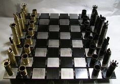 a chess set made out of metal pieces