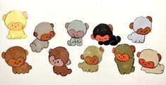 a group of monkey magnets sitting next to each other