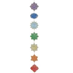 a multicolored wind chime with seven chakras hanging from the side