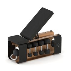 an exercise bench with six dumbs in it and a black cover over the top