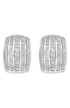 Rows of round-cut diamonds add dazzling shine to huggie-hoop earrings secured in a sterling silver setting. 0.59" hoop diameter; 0.43" width Hinge with snap-post closure Total diamond weight: 1.94ct. Color: I–J Clarity: I3 Sterling silver/diamond Made in the USA Diamond Guide Classic Diamond White Huggie Earrings With Pave Setting, Classic Huggie Earrings With Round Cut Pave Setting, Classic White Huggie Earrings With Diamond Accents, Classic White Huggie Diamond Earrings, Classic Diamond Accented Huggie Earrings For Anniversary, Classic Pave Setting Huggie Earrings For Anniversary, Classic Diamond White Earrings With Channel Set, Classic Diamond White Hoop Earrings With Pave Setting, Channel Set Diamond Huggie Earrings