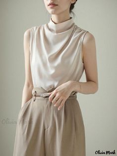 Olivia Mark - Sleeveless High-Neck Blouse with Loose and Vintage Satin Inner Lining Beige Sleeveless Blouse Tank Top For Workwear, Elegant Beige Tank Top For Work, Elegant Beige Sleeveless Tank Top, Sleeveless Beige Workwear Blouse, Sleeveless Beige Blouse For Work, Beige Sleeveless Blouse For Workwear, Elegant Solid Sleeveless Camisole, Elegant Sleeveless Solid Camisole, Elegant Solid Color Sleeveless Camisole