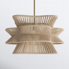 the light fixture is made out of wicker