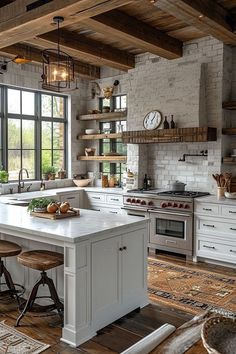 a large kitchen with an island in the middle and lots of counter space on one side