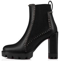 Step into sophistication with the Out Line Spike Lug ankle boots by Maison Christian Louboutin. Crafted in sleek black calf leather, these boots feature an asymmetric elastic insert and a bold 100 mm lug square heel. The signature silver spikes add a touch of edge to this modern classic. Perfect for making a statement, these boots are a must-have for your fall wardrobe. #ChristianLouboutin #AnkleBoots #LuxuryFashion #FallStyle #ShoeGoals Lug Boots