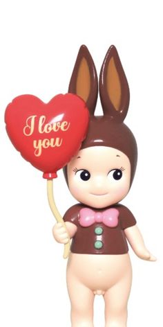 a little bunny holding a heart shaped balloon with the words i love you on it