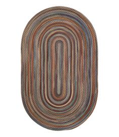 the oval rug is made from multicolored yarn and has a braid pattern on it