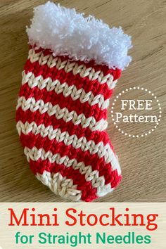 a red and white striped sock sitting on top of a wooden floor with text overlay that reads, mini stocking for straight needles