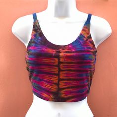 -95% rayon & 5% spandex -Fits bust Size 34-40 inches. -Made in thailand Matching spandex shorts available. Visit our shop at https://www.etsy.com/listing/520947586/tie-dye-spandex-shorts-festival-shorts?ref=shop_home_active_8&frs=1 Stretch Multicolor Crop Top For Music Festival, Summer Triangle Yoga Crop Top, Triangle Crop Top For Yoga In Summer, Triangle Top Crop Top For Yoga In Summer, Bra-friendly Sleeveless Festival Top, Bohemian Stretch Triangle Crop Top, Bohemian Stretch Crop Top With Triangle Shape, Bohemian Crop Top With Built-in Bra For Festivals, Summer Multicolor Crop Top With Built-in Bra