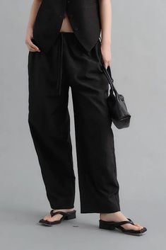 Artful Linen Drawstring Wide Leg Cargo Pants for a Relaxed Chic Look Discover the perfect blend of comfort and style with our Linen Drawstring Wide Leg Cargo Pants. Featuring a drawstring waist, these low-rise cargo pants offer a relaxed and customizable fit. The wide-leg silhouette and utility-focused design are not only fashionable but also offer plenty of room for movement. Crafted from natural linen, these pants ensure a cool and breathable experience, perfect for a laid-back summer look. St Versatile Wide-leg Pants With Tie Waist, Loosely Fitted Harem Pants With Drawstring, Loosely Fitted Straight Harem Pants With Drawstring, Straight Harem Pants With Drawstring, Loosely Fitted Ankle-length Harem Pants With Drawstring, Wide-leg Pants With Drawstring, Versatile Solid Color Pants With Drawstring, Versatile Solid Pants With Drawstring, Solid Color Wide-leg Pants With Tie Waist