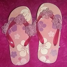 Pink Sandals With Flowers Patterns Size 2 Nwt Pink Open Toe Plastic Flip Flops, Pink Plastic Flip Flops With Round Toe, Pink Plastic Flip Flops For Summer, Pink Plastic Summer Flip Flops, Fun Pink Plastic Sandals, Pink Plastic Fun Sandals, Cute Purple Sandals For Spring, Cute Pink Flip Flops For Vacation, Fun Pink Non-slip Flip Flops